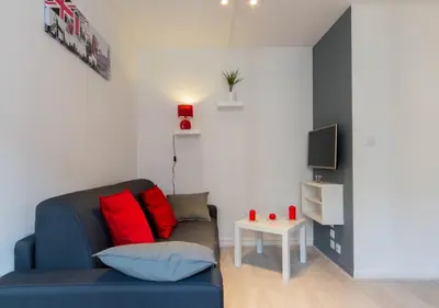 Coin salon dans l'établissement Sweet Home Dijon Nodot