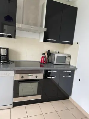 Cuisine ou kitchenette dans l'établissement Gîte Les Minimes