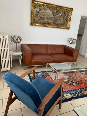 Coin salon dans l'établissement Gîte Les Minimes