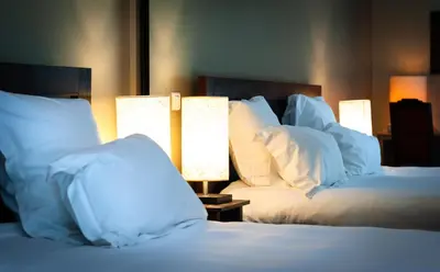 Un ou plusieurs lits dans un hébergement de l'établissement Hôtel La Gentilhommière