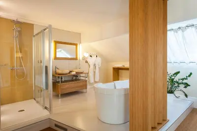 Salle de bains dans l'établissement Maison Doucet - Relais & Châteaux