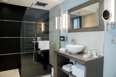 Salle de bains dans l'établissement Maison Doucet - Relais & Châteaux