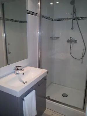 Salle de bains dans l'établissement Hôtel Du Stade