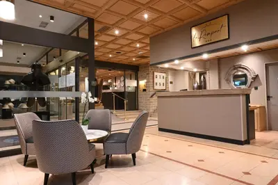 Coin salon dans l'établissement Hôtel Le Rempart
