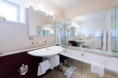 Salle de bains dans l'établissement Teritoria le Château de Besseuil