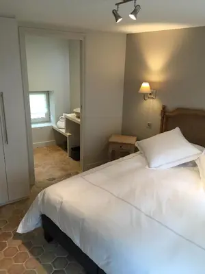 Un ou plusieurs lits dans un hébergement de l'établissement La Maison des Belles Filles
