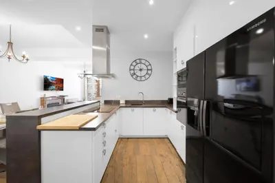 Cuisine ou kitchenette dans l'établissement Le Home Carnot