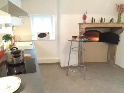 Cuisine ou kitchenette dans l'établissement La maison de Jeannot