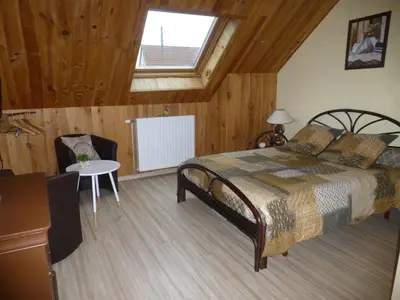 Un ou plusieurs lits dans un hébergement de l'établissement chambres d'hôte Le Marronnier