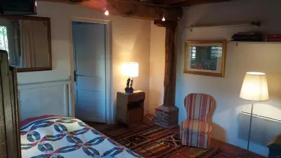 Un ou plusieurs lits dans un hébergement de l'établissement Le Studio de Brianny