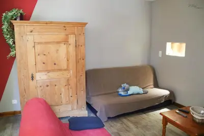 Coin salon dans l'établissement Gîte De La Souris Verte