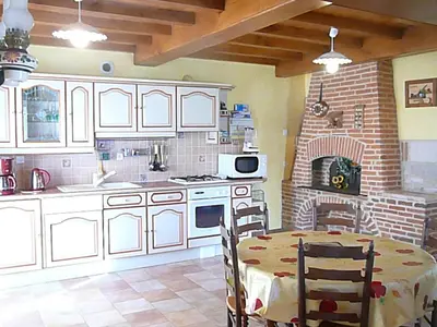 Cuisine ou kitchenette dans l'établissement Domaine des Charmilles