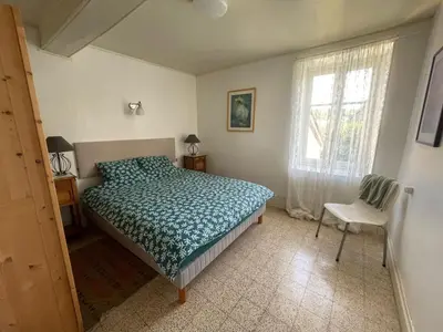 Un ou plusieurs lits dans un hébergement de l'établissement Maison Lavande