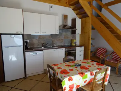 Cuisine ou kitchenette dans l'établissement Maison Gille