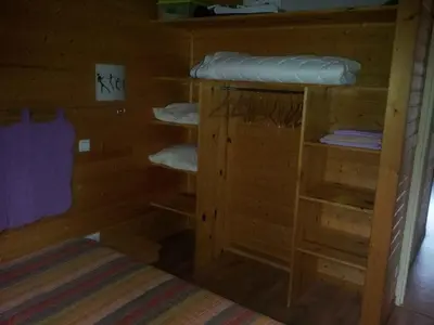 Un ou plusieurs lits dans un hébergement de l'établissement Chalets les Silènes