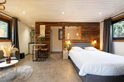 Un ou plusieurs lits dans un hébergement de l'établissement Pied à Terre - Appart'hôtels au coeur d'Autun