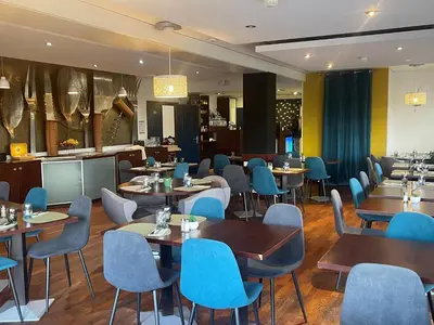 Restaurant ou autre lieu de restauration dans l'établissement Kyriad Dijon Est Mirande