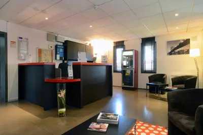 Télévision ou salle de divertissement dans l'établissement Hôtel Inn Design Dijon Est - Quetigny