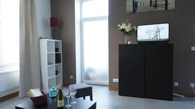 Télévision ou salle de divertissement dans l'établissement Le Puligny, appartement classé 3 étoiles