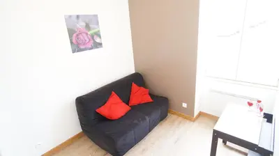 Coin salon dans l'établissement Le Puligny, appartement classé 3 étoiles