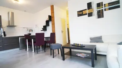 Cuisine ou kitchenette dans l'établissement Le Puligny, appartement classé 3 étoiles