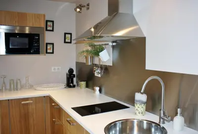 Cuisine ou kitchenette dans l'établissement Le Comptoir du Voyageur