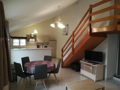 Coin salon dans l'établissement Gîte de la Forêt