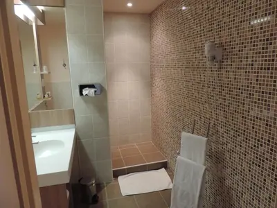 Salle de bains dans l'établissement Au Moulin des Ecorces