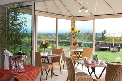 Restaurant ou autre lieu de restauration dans l'établissement Hôtel Le Kolibri
