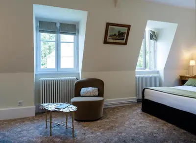 Un ou plusieurs lits dans un hébergement de l'établissement Château de Saulon