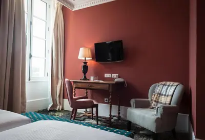 Télévision ou salle de divertissement dans l'établissement Château de Saulon