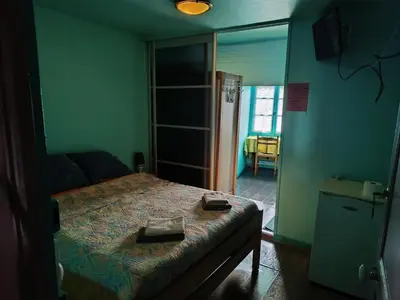 Un ou plusieurs lits dans un hébergement de l'établissement Auberge Du Bon Coin