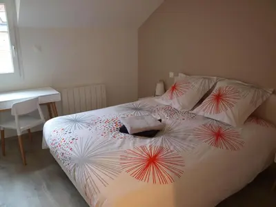 Un ou plusieurs lits dans un hébergement de l'établissement Cottage nuiton