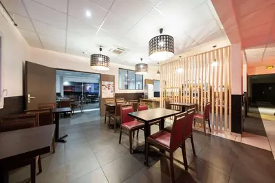 Restaurant ou autre lieu de restauration dans l'établissement Kyriad Dijon Sud - Longvic