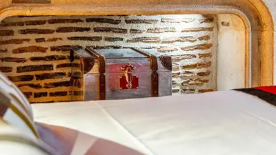 Un ou plusieurs lits dans un hébergement de l'établissement Hotel Relais De La Cote D'or
