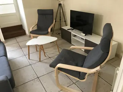 Télévision ou salle de divertissement dans l'établissement La Bourguignotte