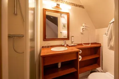 Salle de bains dans l'établissement Teritoria Hôtel Wilson