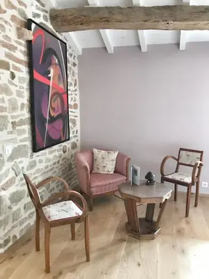 Coin salon dans l'établissement Chambres d'hôtes Vers la Croix