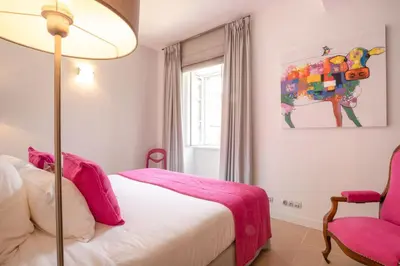 Un ou plusieurs lits dans un hébergement de l'établissement Les Demeures du Tonnelier, Maison Rue