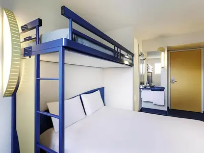 Un ou plusieurs lits dans un hébergement de l'établissement ibis Budget Pouilly-en-Auxois