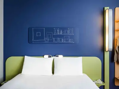 Un ou plusieurs lits dans un hébergement de l'établissement ibis Budget Pouilly-en-Auxois