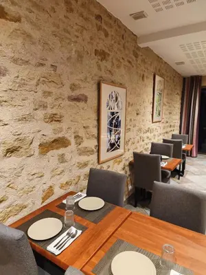 Coin salon dans l'établissement Hôtel La Reconce