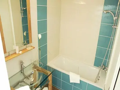 Salle de bains dans l'établissement Le Chagny