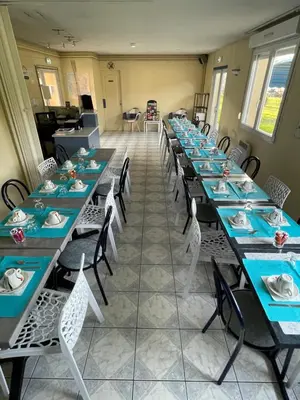 Restaurant ou autre lieu de restauration dans l'établissement Europe Hotel