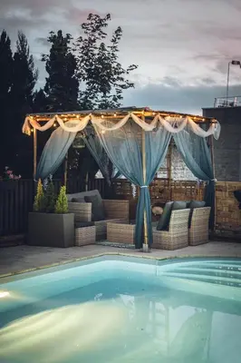Piscine de l'établissement Logis Hôtel Vuillot ou située à proximité