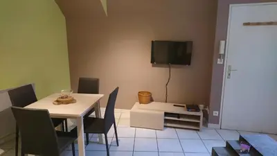 Télévision ou salle de divertissement dans l'établissement Le Jim : Rue Musette