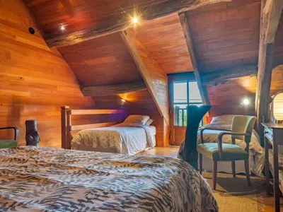 Un ou plusieurs lits dans un hébergement de l'établissement Holiday Home Marguerite by Interhome