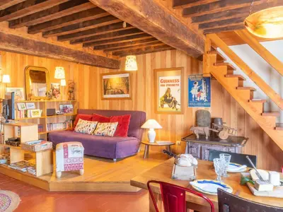 Coin salon dans l'établissement Holiday Home Marguerite by Interhome