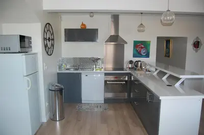 Cuisine ou kitchenette dans l'établissement La Maison de Marie