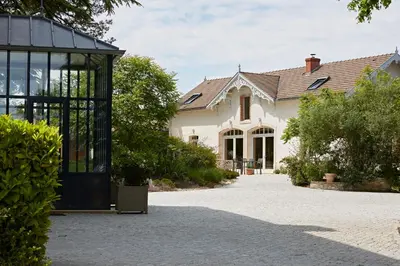 Jardin de l'établissement EVIDENCE Maison d'Hôtes